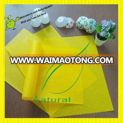 Hot sale yellow color siliconized greaseproof paper in stock for cake cup making